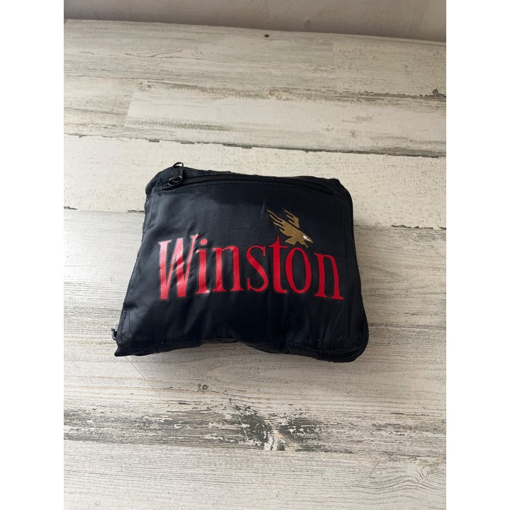 Winston fold and zip up black windbreaker type zippered duffle bag